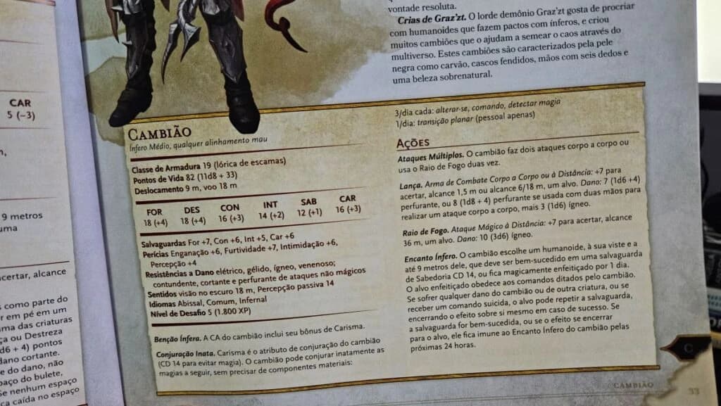 Página de livro de regras mostrando o bloco de estatísticas do demônio Cambião, com atributos, ações e ilustração de pernas blindadas